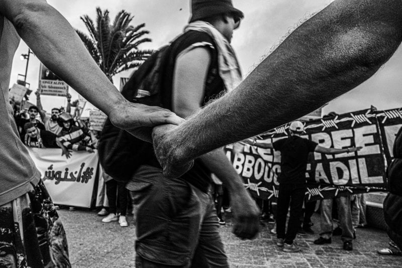 Protestors join hands at a GenZ 212 demonstration. Casablanca, Morocco. (Photo courtesy of Issam Chorib). 